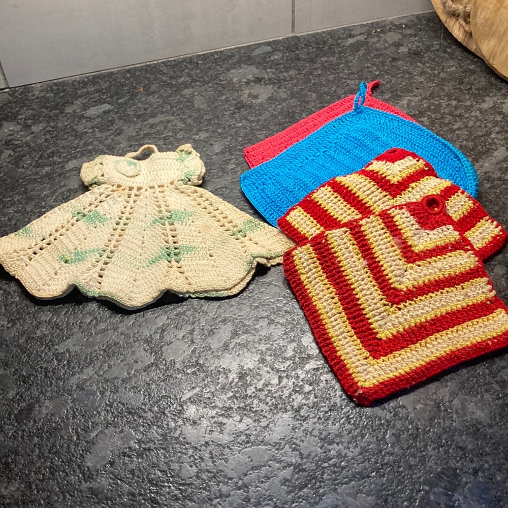 Vintage crochet pot holders  & dress for dish soap contain…